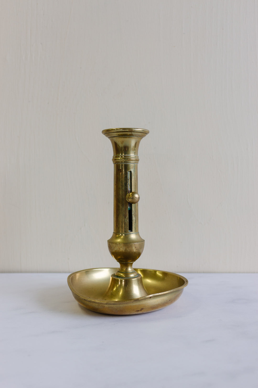 vintage French brass “push up” candlesticks