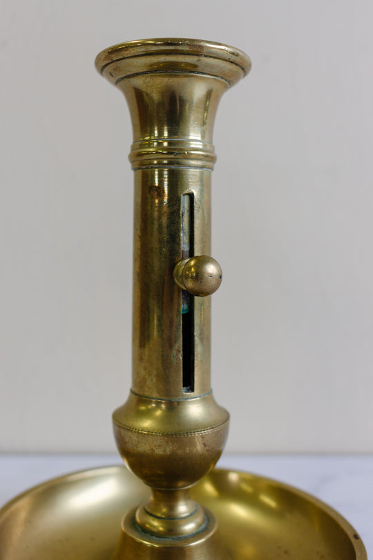 vintage French brass “push up” candlesticks