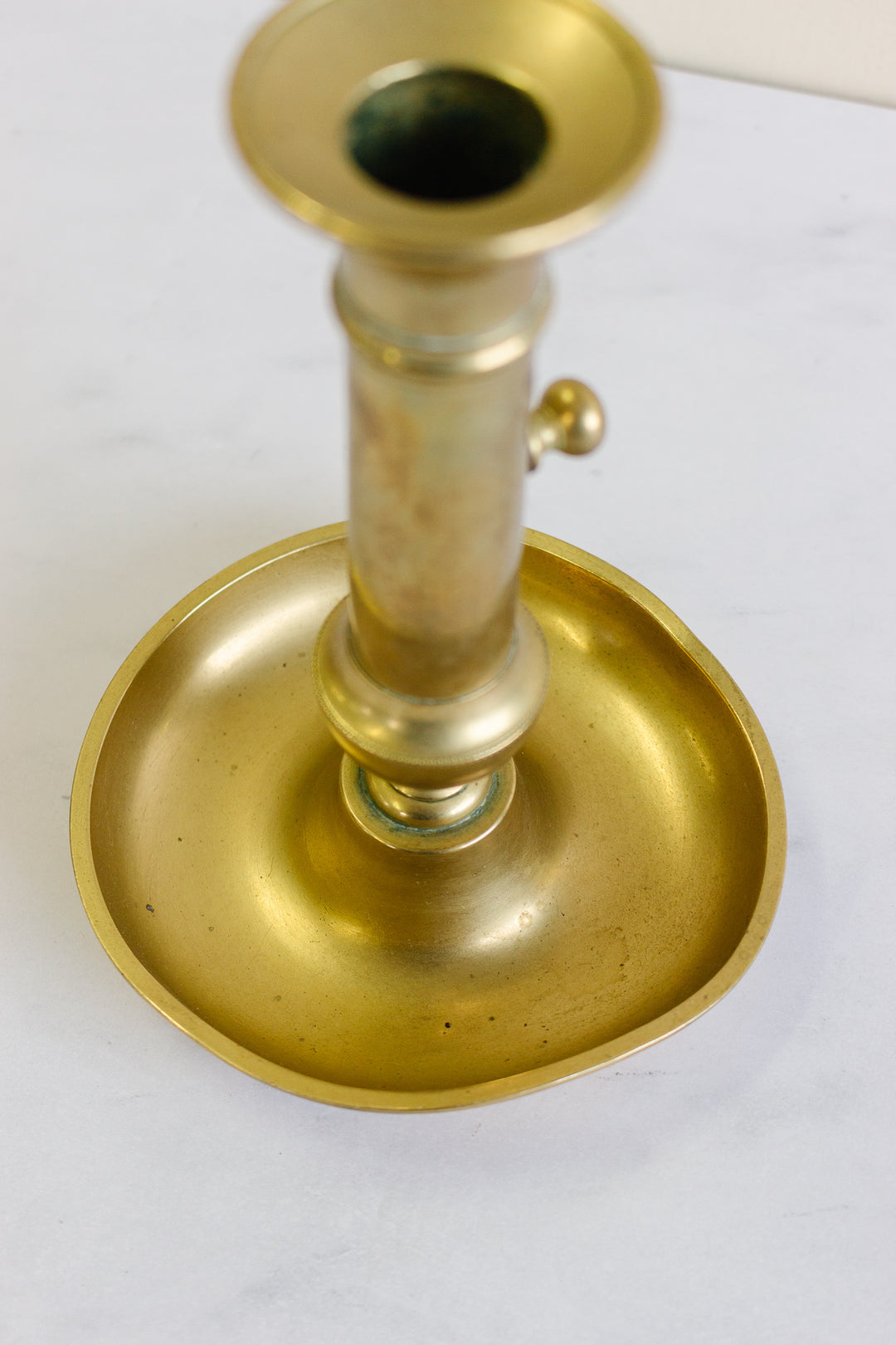 vintage French brass “push up” candlesticks