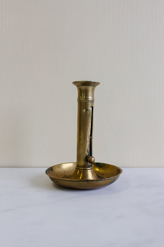 vintage French brass “push up” candlesticks