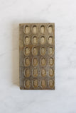 turn of the century Italian stamped cast iron chocolate mould