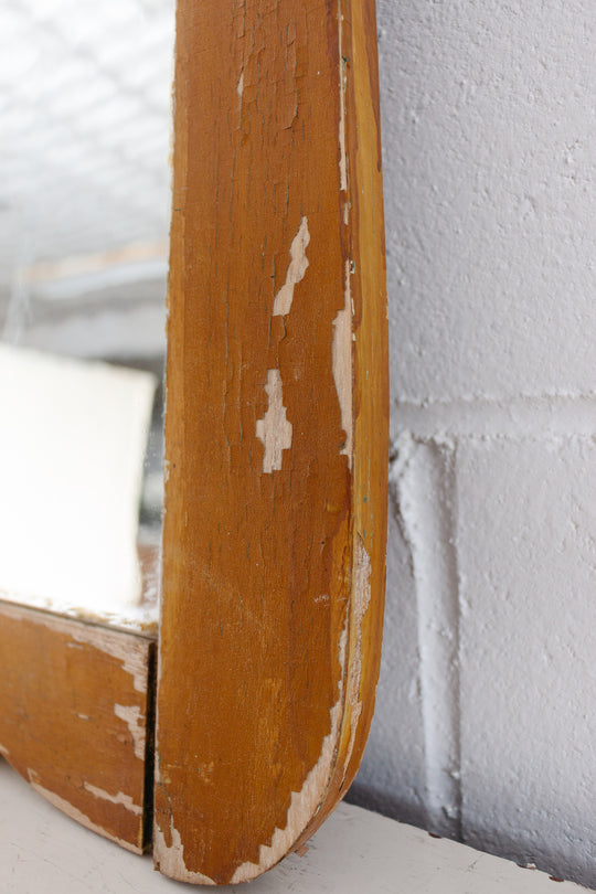 antique carved wood mirror with wavy glass