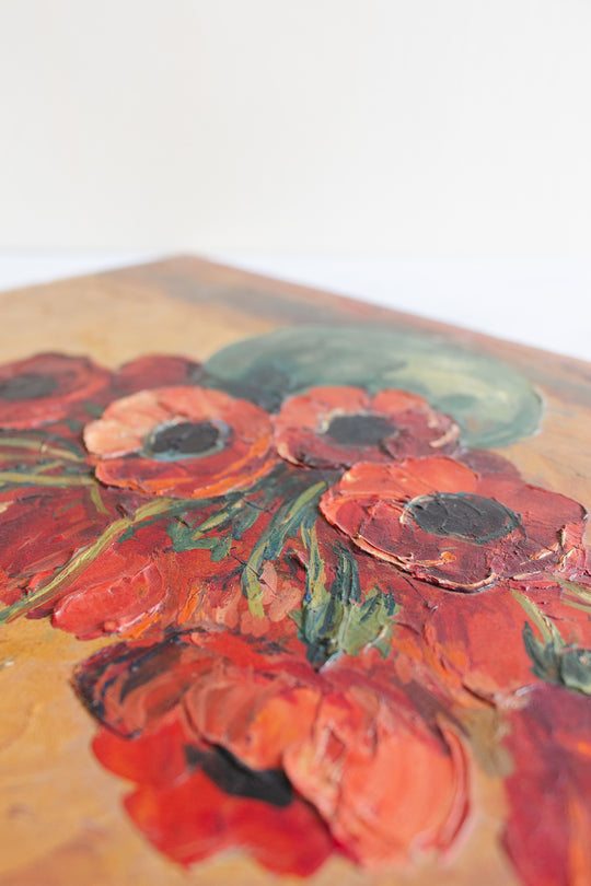 vase vert avec coquelicots