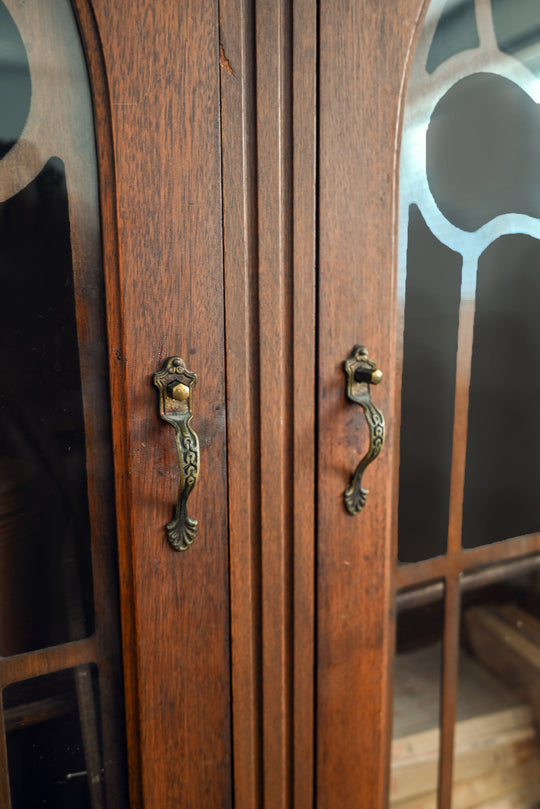 vintage wood cabinet with glass doors