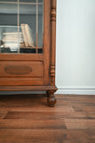 vintage wood cabinet with glass doors