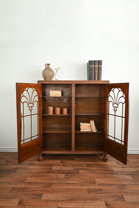 vintage wood cabinet with glass doors