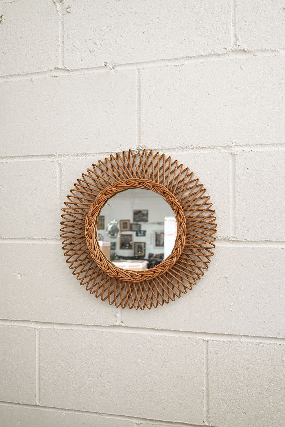 midcentury french sunburst rattan mirror