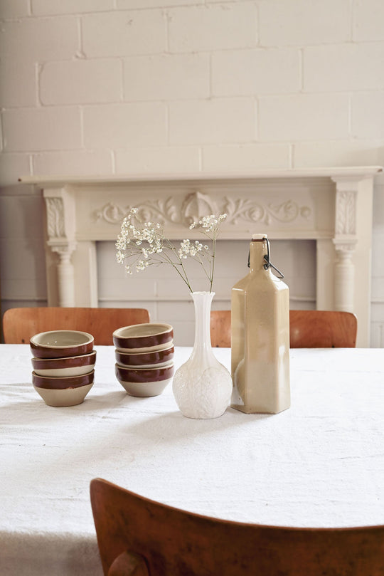 vintage french hexagonal stoneware bottle with porcelain lid