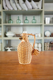 vintage french wicker wrapped demijohn
