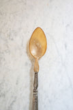 antique french horn and silver repousse serving spoon