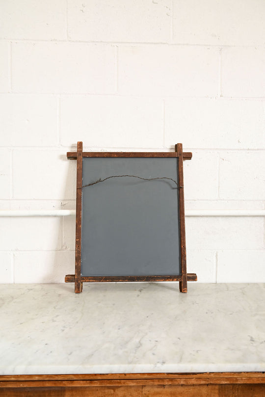 vintage criss cross framed mirror