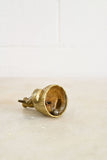 vintage french brass "lady bell" carrying water