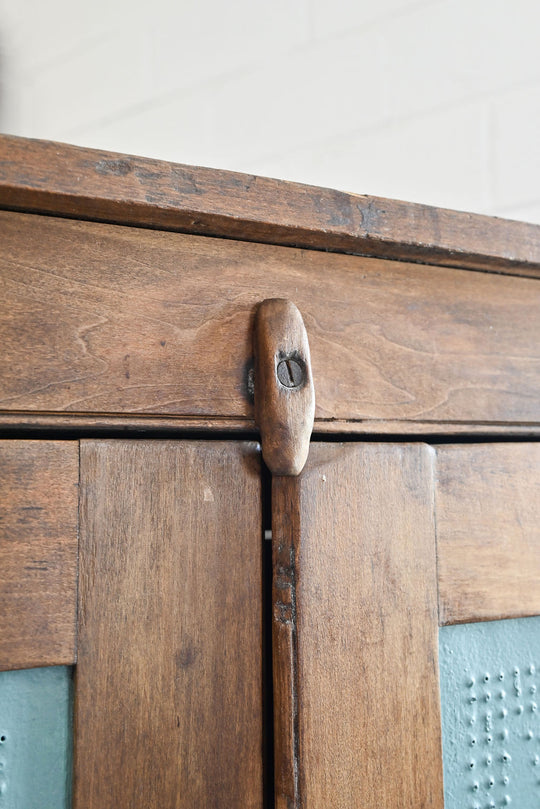 antique pie cupboard with pressed tin panels