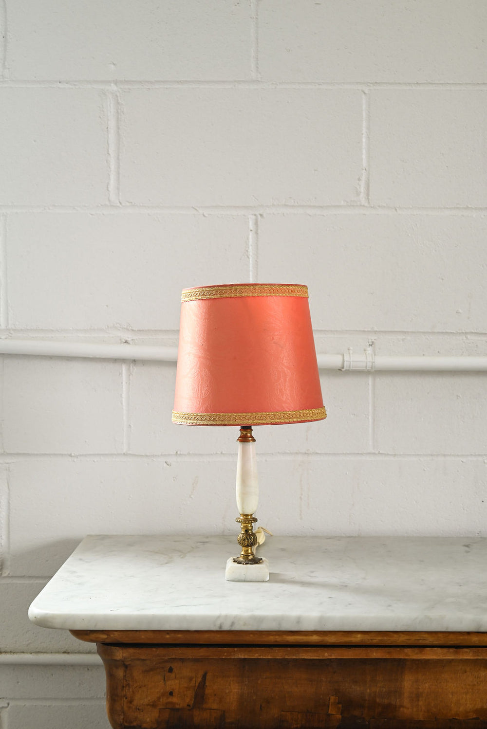 vintage french marble and brass lamp with coral shade