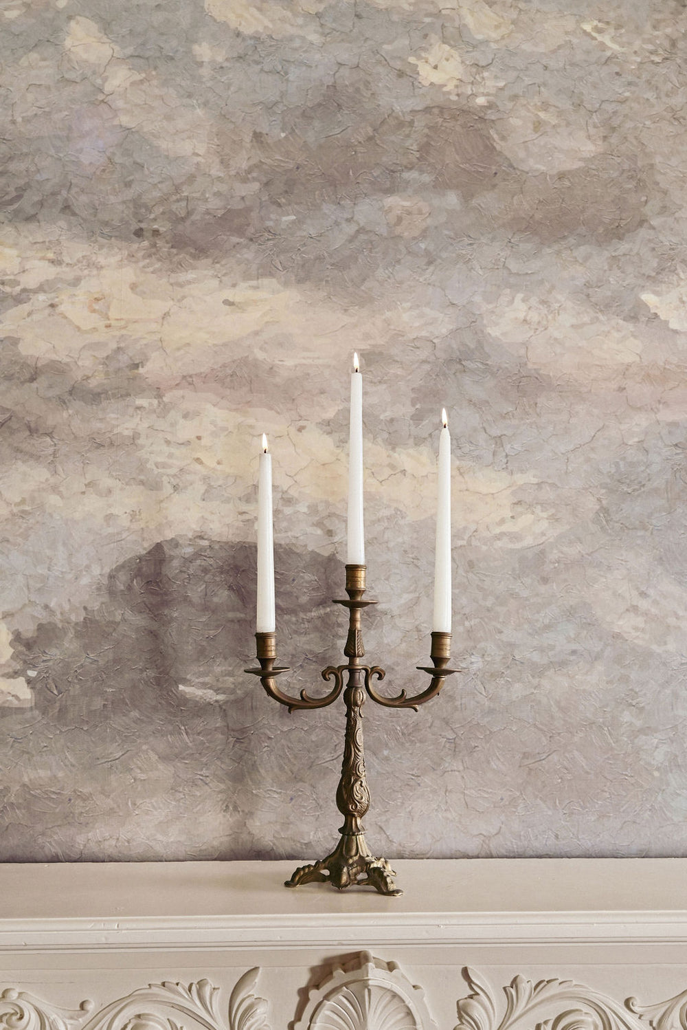 pair of vintage french cast metal candelabras