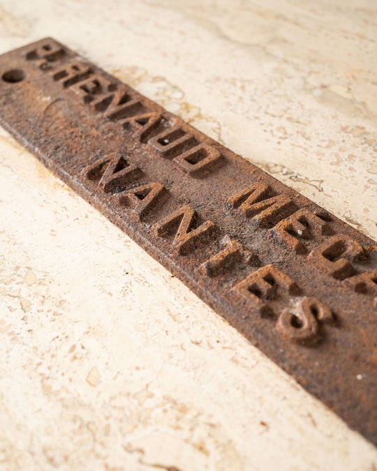 antique french cast iron mechanic sign