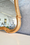 vintage french flared gilt mirror