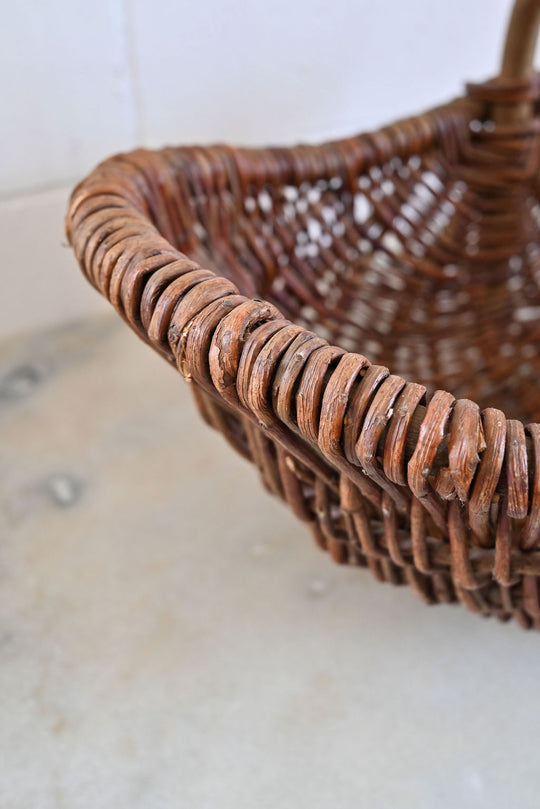 antique French gathering basket with bentwood handle
