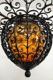 vintage caged amber light fixture