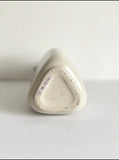 vintage french triangular stonware bottle with procelain lid