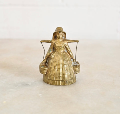 vintage french brass "lady bell" carrying water