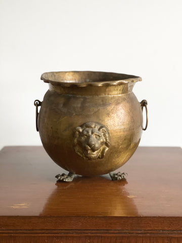 vintage brass lion’s head footed vessel