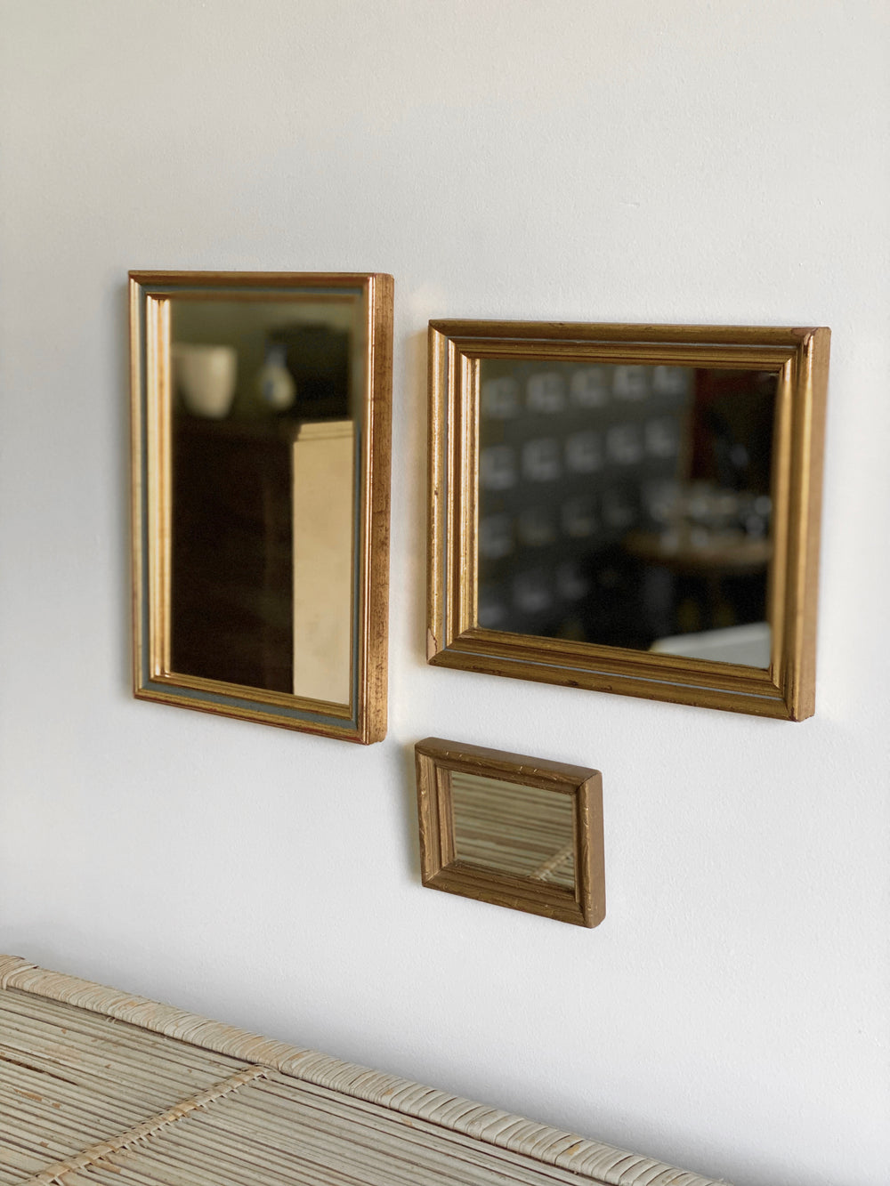 trio of vintage mirrors