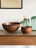 set of vintage copper bowls
