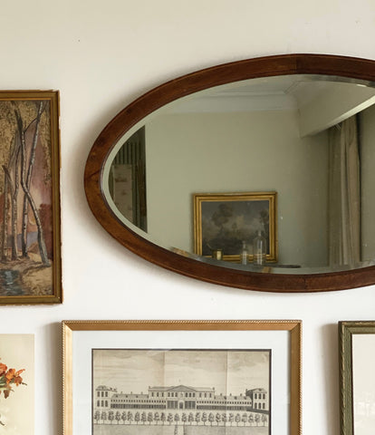Edwardian oval mahogany beveled mirror