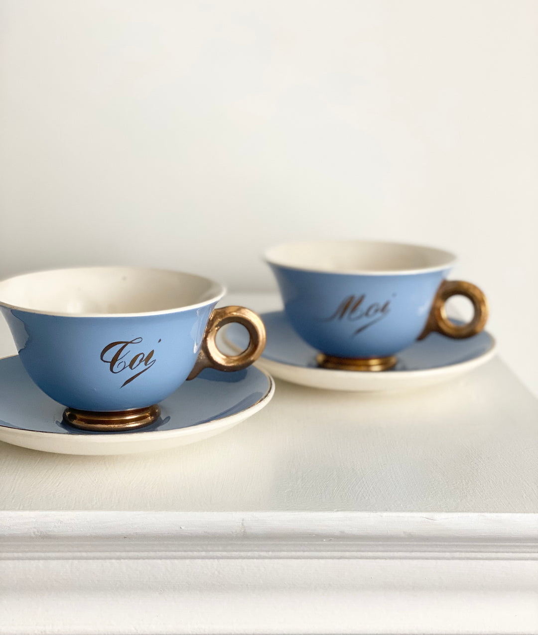 antique french "toi et moi" gold and cerulean teacups and saucers