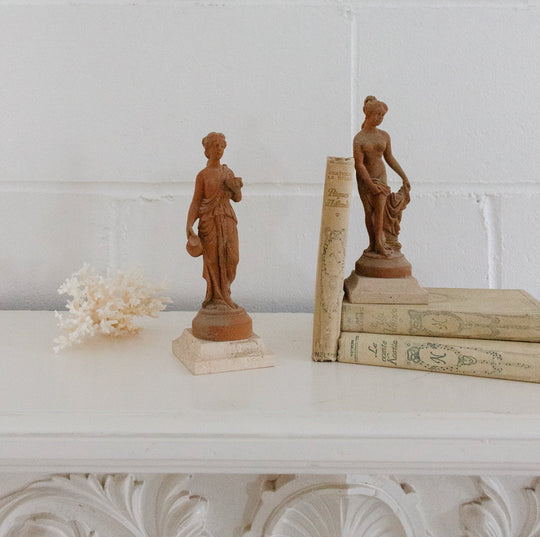 vintage Italian Grecian terra cotta sculptures with tivoli travertine base