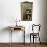 vintage French provincial table with wood inlay