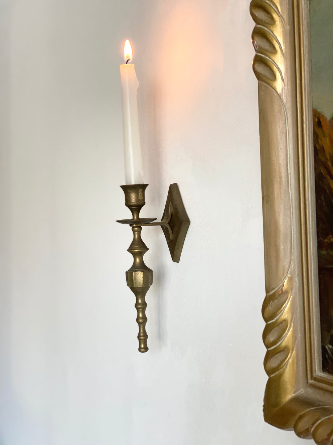 pair of brass torch candle sconces