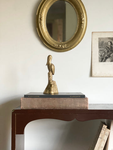 vintage brass pelican