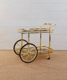 vintage 1970s french brass bar cart with smoky glass