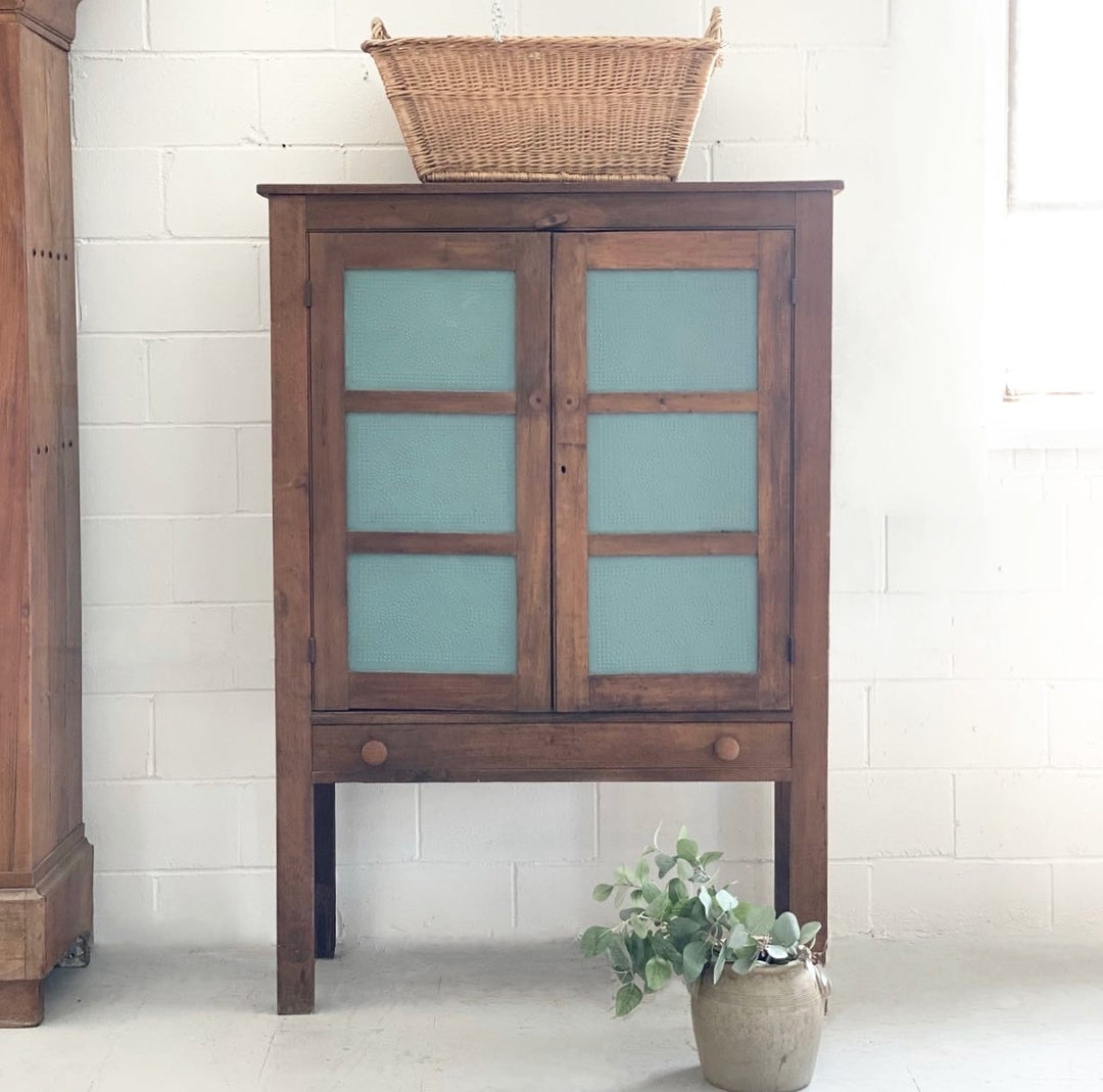 antique pie cupboard with pressed tin panels