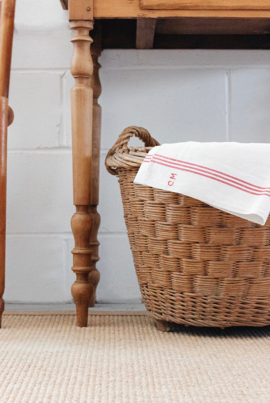 antique French round willow laundry basket