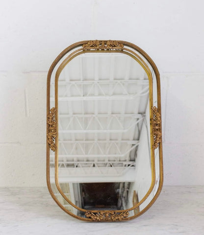 vintage oblong gilt metal dresser mirror