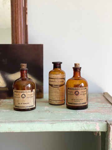 rare set of 3 small antique apothecary bottles