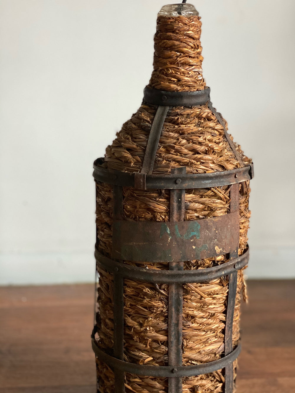 vintage wrapped demijohn