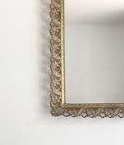 vintage pressed tin frame mirror
