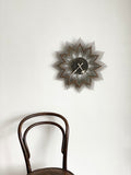 German brutalist nail art sunburst clock