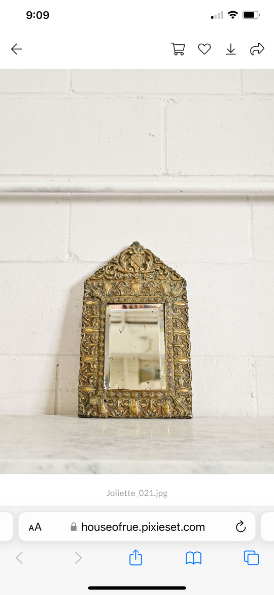 antique French petite repousse mirror with beveled glass