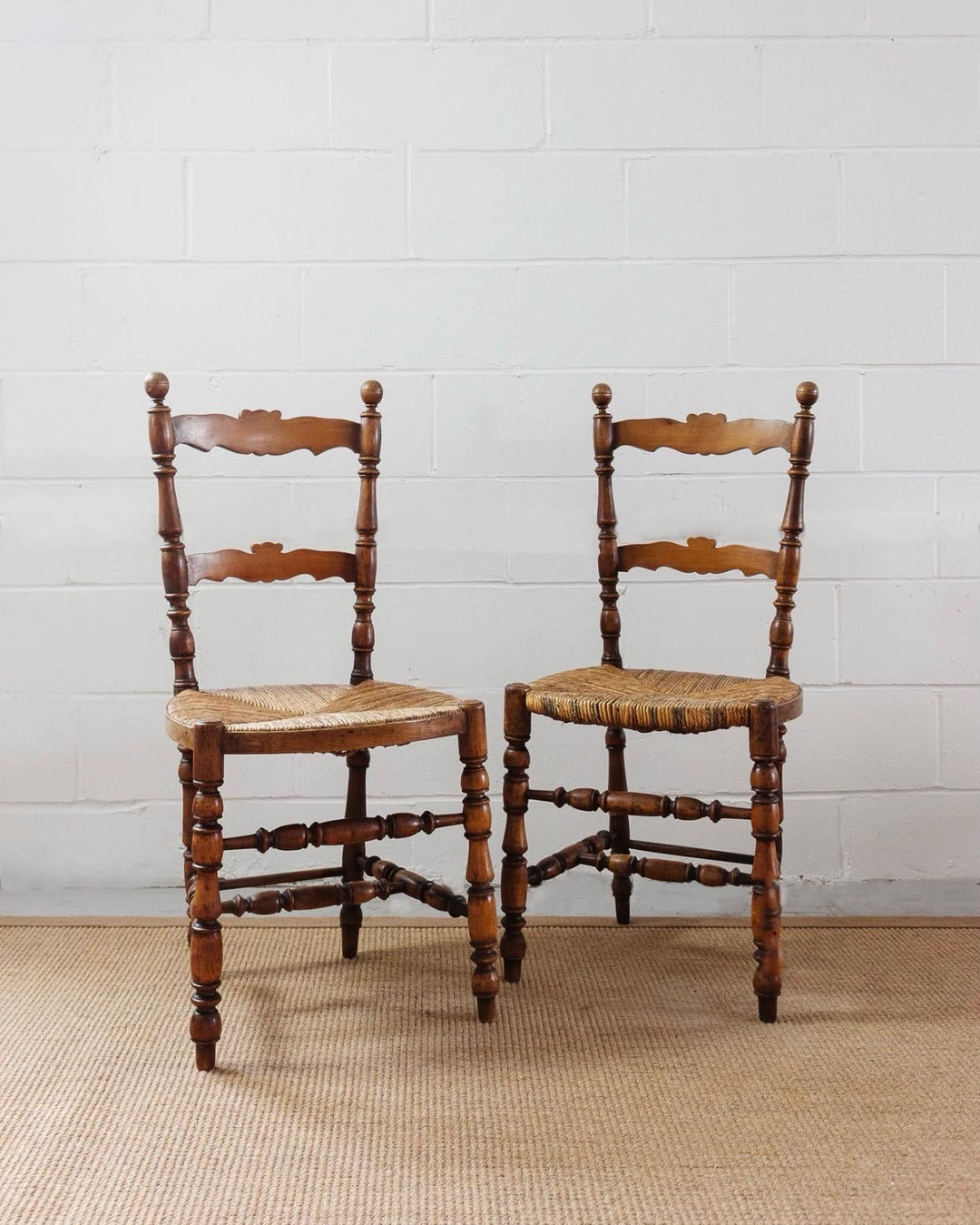 pair of 19th century French provincial walnut and rush chairs