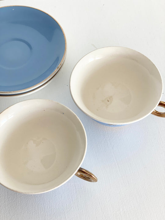 antique french "toi et moi" gold and cerulean teacups and saucers