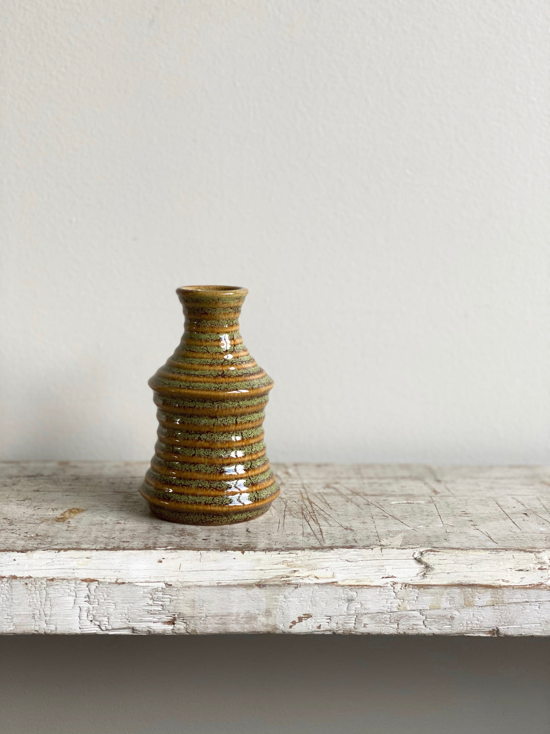 small striped pottery bud vase
