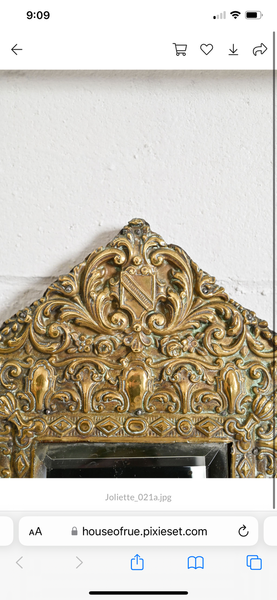antique French petite repousse mirror with beveled glass