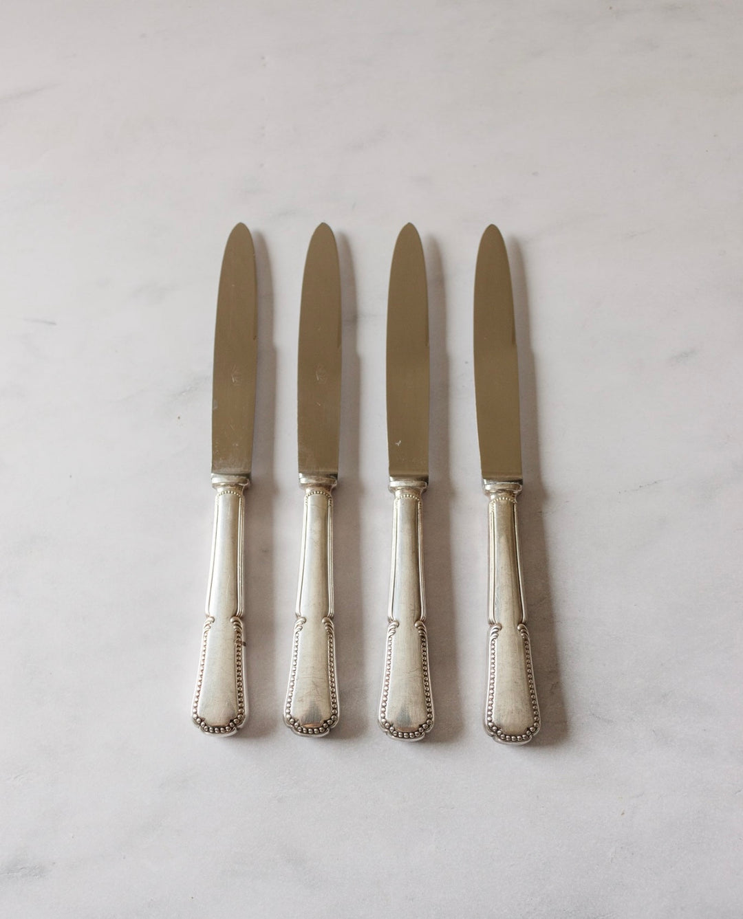 vintage french silverplate knives, set of 9