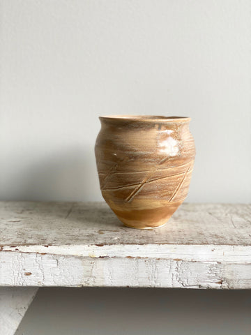 carved pottery jar