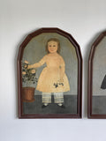 pair of framed vintage primitive folk art prints